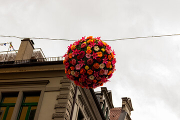 Konstanz, Germany- May 28, 2025: Konstanz old town (altstadt) flower balls colorful decorations...