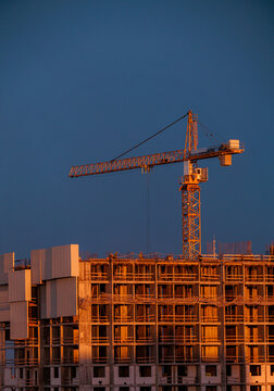 Tower Crane and Building Construction at Sunset