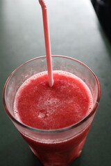 strawberry smoothie in a glass