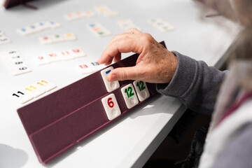 woman playing rummikub