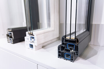 Samples of the profile of modern PVC windows on the showcase