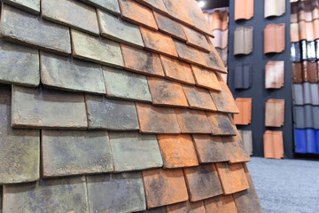 Samples shingles for the roof in the exhibition hall. Construction industry