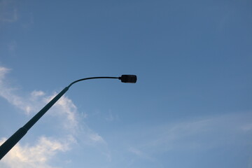 street lamp on blue sky