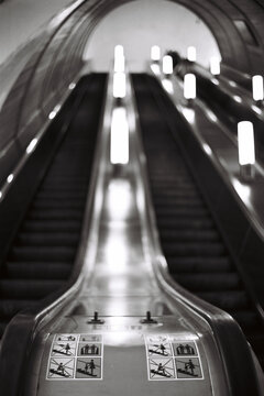 perspective and vanishing point empty Escalator with Safety Signs 