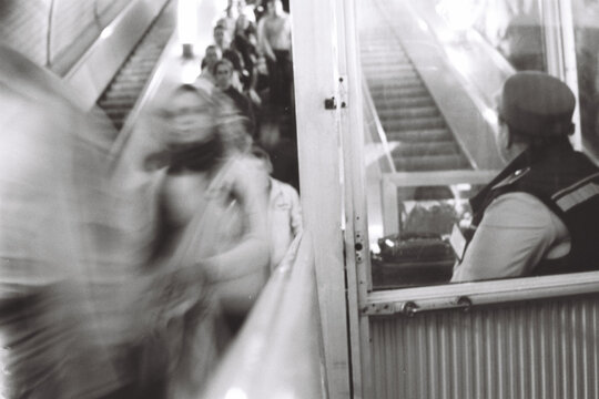 Anonymous escalator and Monitor worker with human flow 