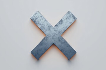 Obraz premium Close-up of a weathered metal cross shape placed on a smooth light gray surface casting soft shadows