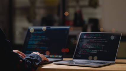 Closeup Developers Hands Intensely Typing On Laptop At Dim Desk, Highlighting Intricate Data Code Night Office Background Lights Create Focused Workspace