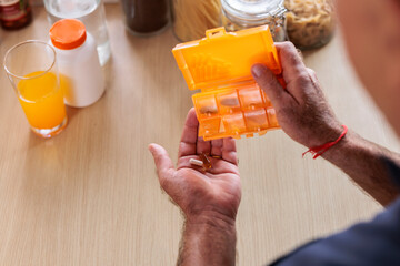 Man getting daily pills