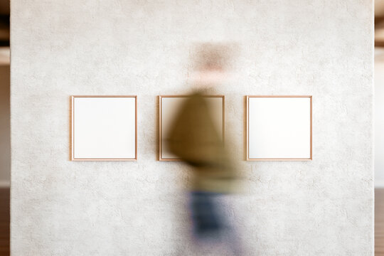 Wall Art Frames Mockup - Anonymous Viewer in Motion