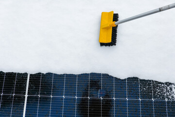 Solar Panel Efficiency in Winter.layers of snow on solar panels. Getting electricity with solar...