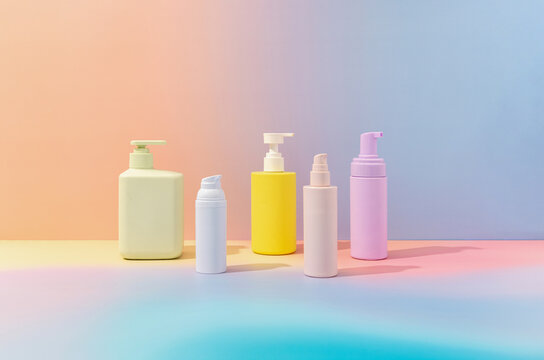 Pastel gradient bottles and packaging mockup display