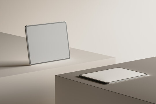 Minimal still life showcasing sleek tablet on modern surface