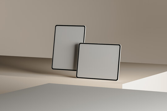 Minimal still life showcasing sleek tablet on modern surface