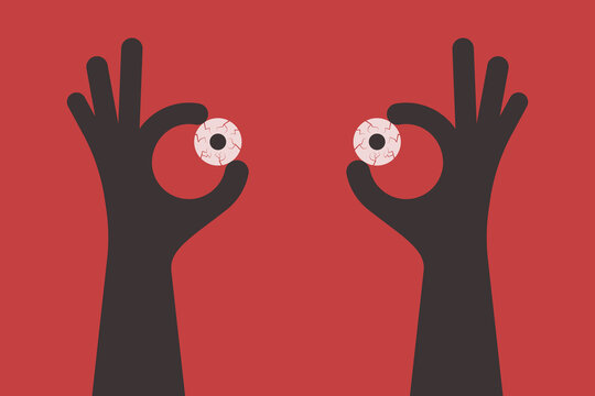 Hands hold eyes