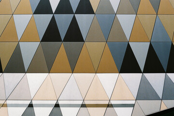 Artistic patterned wall with colorful triangular shapes