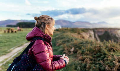 Woman on Cliffside