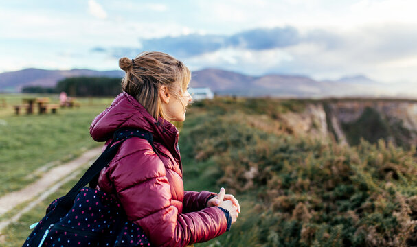 Woman on Cliffside