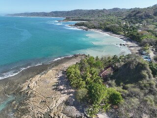 Montezuma Beach: Turquoise Waters and Rocky Coastline Views