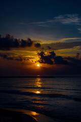 Sea beach with sky sunset or sunrise. Clouds over the sunset sea.