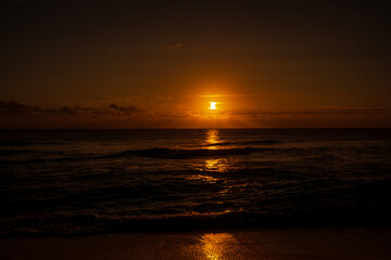 Sea beach with sky sunset or sunrise. Clouds over the sunset sea.