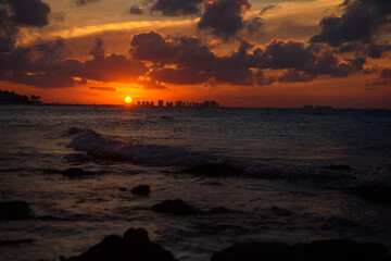 Sea beach with sky sunset or sunrise. Clouds over the sunset sea.