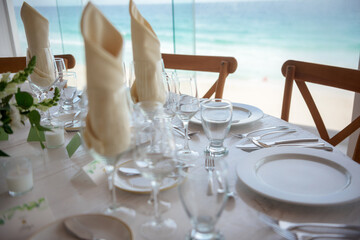 elegant banquet tables prepared for a conference or a party indoors
