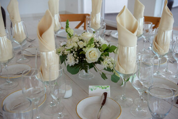 elegant banquet tables prepared for a conference or a party indoors