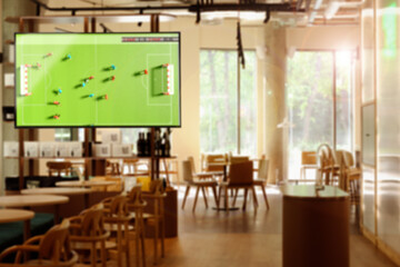 Broadcasting soccer match on TV set in bar