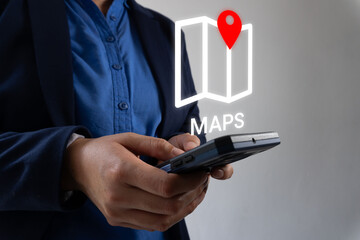 Businessman's hands holding smartphone with map icon with a location pin