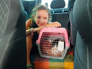 UGC. Happy Girl with Cat in Car Journey