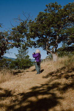 Photographer on Forest Trail