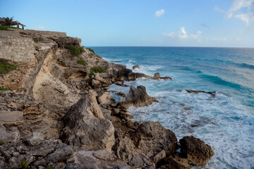 The coastline of the Caribbean Sea with white sand and rocks