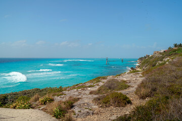 The coastline of the Caribbean Sea with white sand and rocks