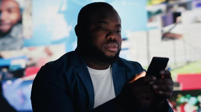 African american person deals with consequences of overusing social networks, faces stress and mental health due to digital dependence. Facing harmful toxic information overload. Camera B.