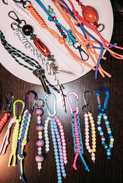 Colorful keychains and handmade accessories displayed on a table