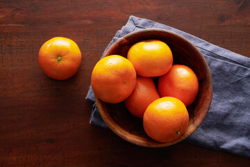 Clementine Oranges in a Wooden Bowl 