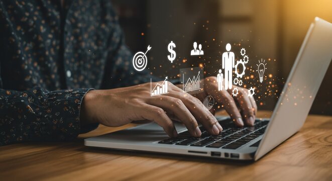Hands Typing on Laptop with Digital Business Icons