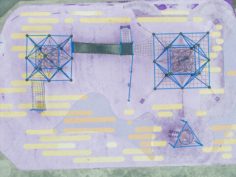 Modern Blue Climbing Structures on Purple Playground Surface