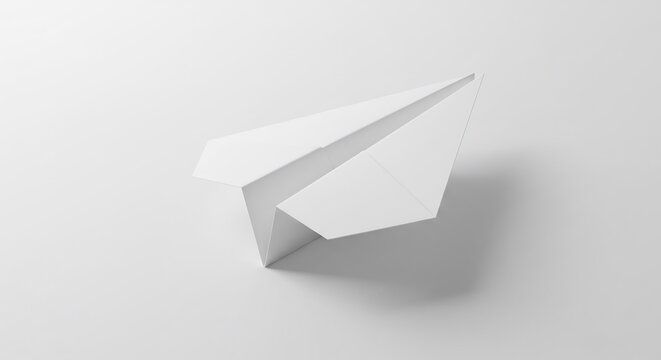 Clean white paper airplane subtly casts shadow on bright background. AI Generated - Powered by Adobe
