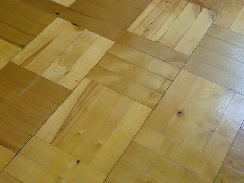 The texture of the old parquet in the apartment