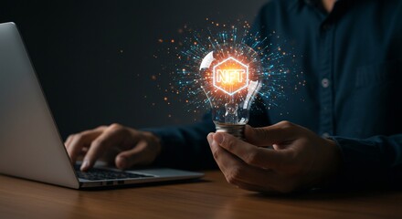 NFT Concept: Light Bulb with Digital Art and Laptop