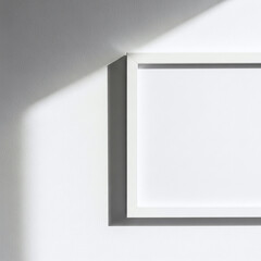 Fototapeta premium White Photo Frame Mockup on Wall with Light and Shadow