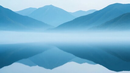 Misty Mountain Reflections on a Calm Lake