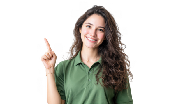 A cheerful young woman wearing a green polo shirt points to the side. showcasing a friendly demeanor in a bright. minimalist setting ideal for promotional or advertising purposes
