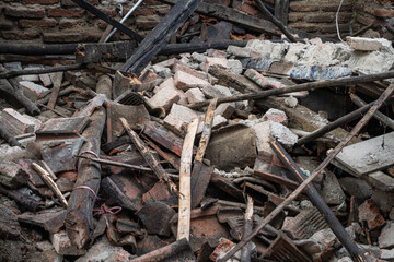Collapsed abandoned house with scattered wood and bricks seen from multiple angles