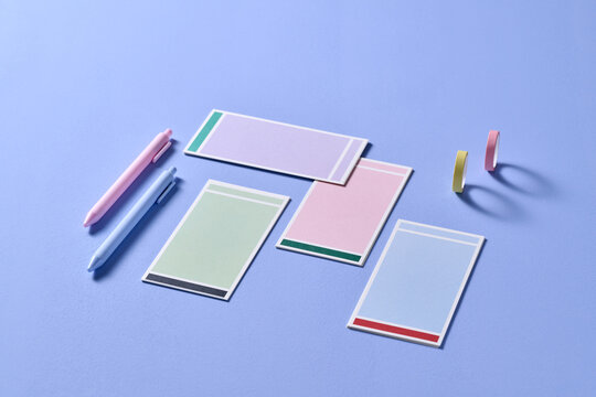 Pens and sticky notes in a colorful arrangement