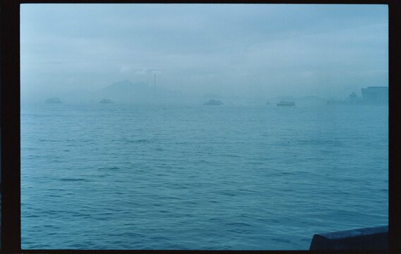 Sea, boats and fog