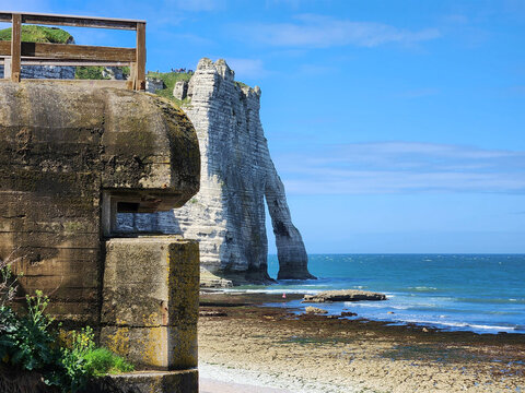 Bunker from WWII with iconic cliffs on background in Etretat, Normandy