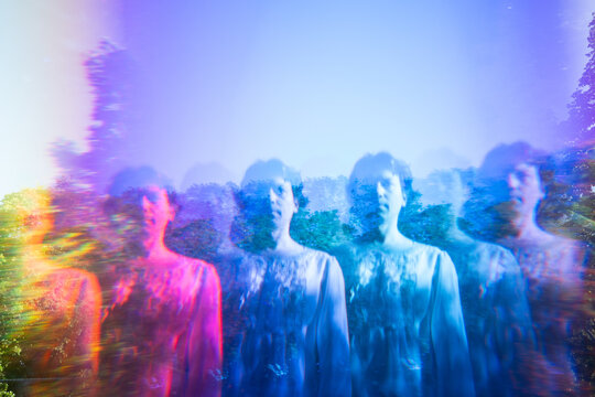 Multiple long exposure portraits with vivid color filters outdoors