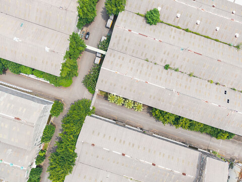 Aerial View of Industrial Cable Factory with Green Buffer Zones
